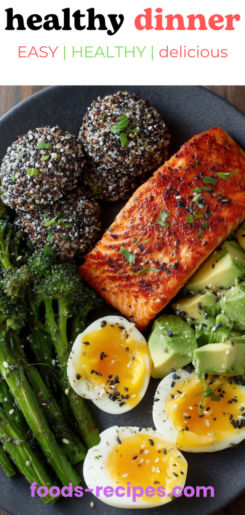 Healthy salmon dinner bowl with grilled salmon, quinoa balls, avocado, broccoli, and soft-boiled eggs – balanced nutritious meal.