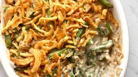 Easy and delicious green bean casserole recipe served in a dish.