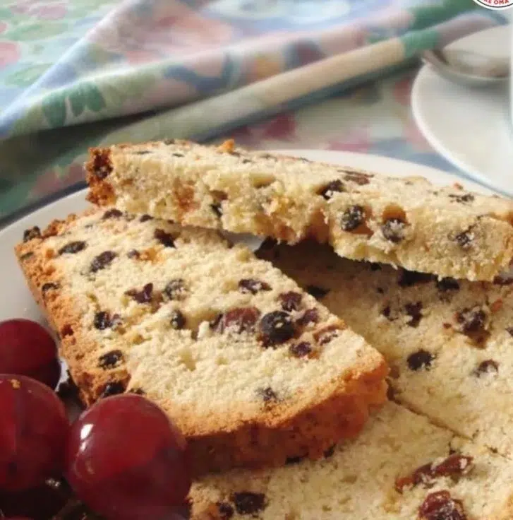 Delicious King's Cake adorned with colorful icing and a hidden baby figurine