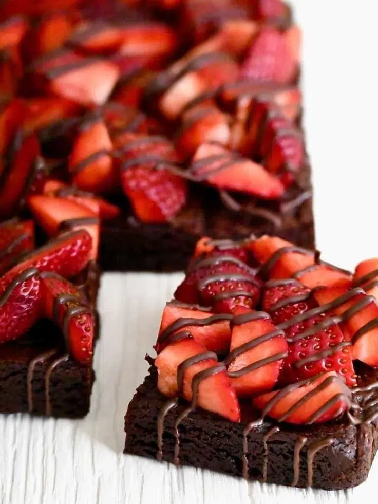 Delicious Valentine's Day desserts, including cakes and chocolates for sharing.