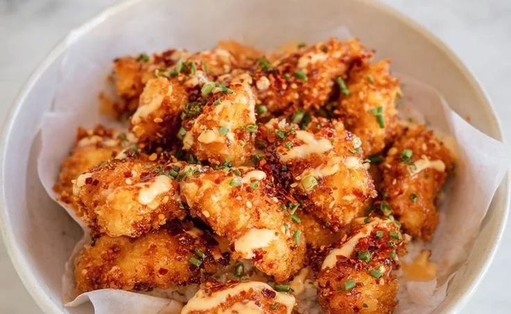 Crispy Air Fryer Bang Bang Chicken served with dipping sauce
