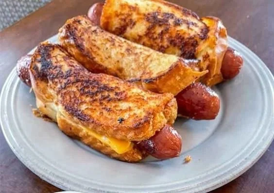Air Fryer grilled cheese hot dogs served on a plate