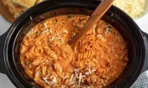 Serving of Crock Pot Creamy Chicken Parmesan Soup in a bowl