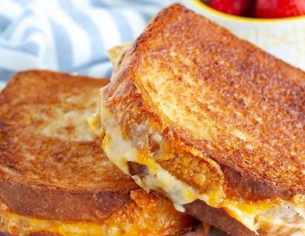 Delicious easy air fryer grilled cheese sandwich with melted cheese