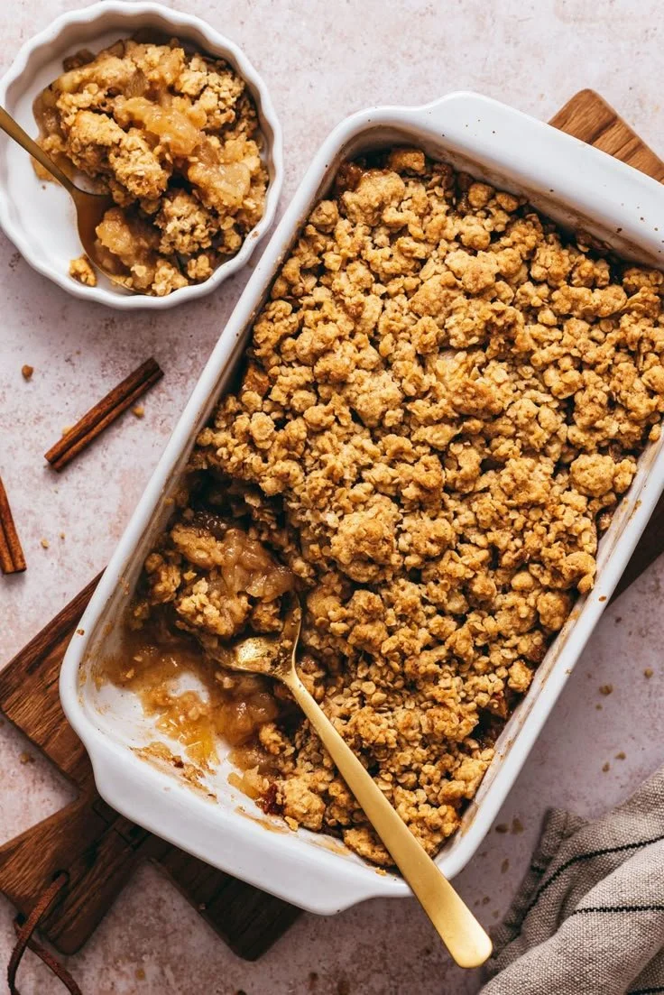 Delicious homemade fruit crumble topped with golden crumble crust.