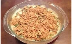 Delicious green bean casserole topped with crispy onions