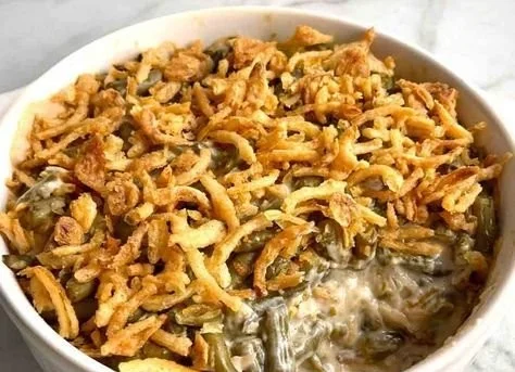 Delicious green bean casserole with crispy topping and fresh green beans