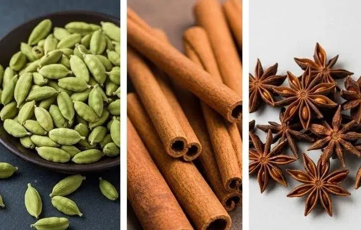 A steaming cup of perfect black tea for chai on a wooden table.