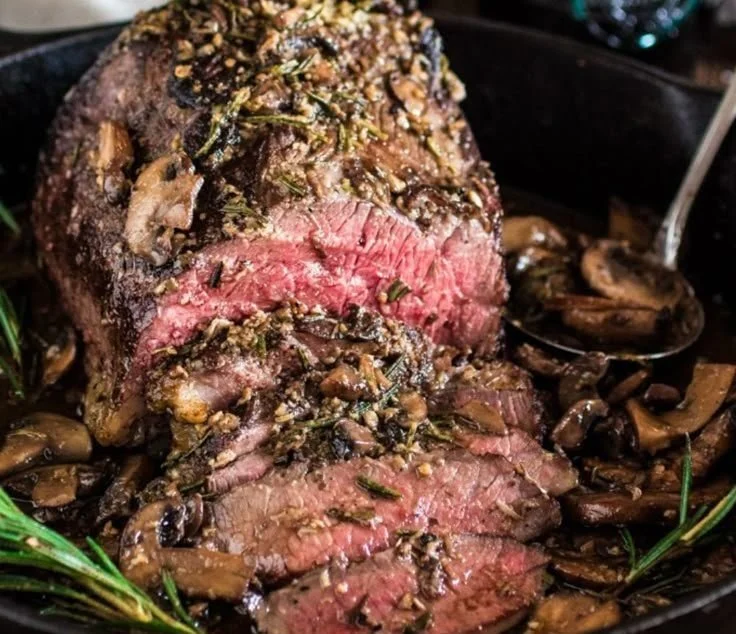 Delicious Rosemary and Garlic Roast Beef ready to be served.