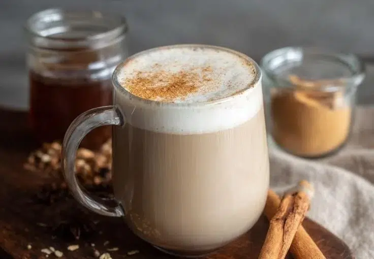 Spiced Chai Latte Concentrate in a cup, garnished with spices