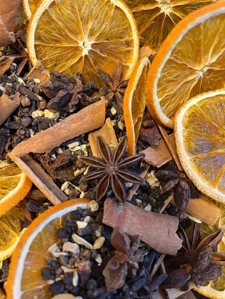 A warm cup of Starlit Chai Tea with spices and a starry night backdrop.