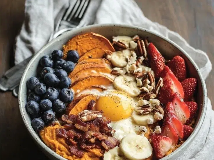 Delicious sweet potato breakfast bowl topped with fresh ingredients