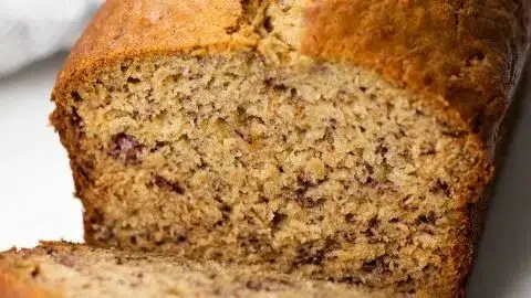 Homemade one bowl banana bread sliced and ready to serve.