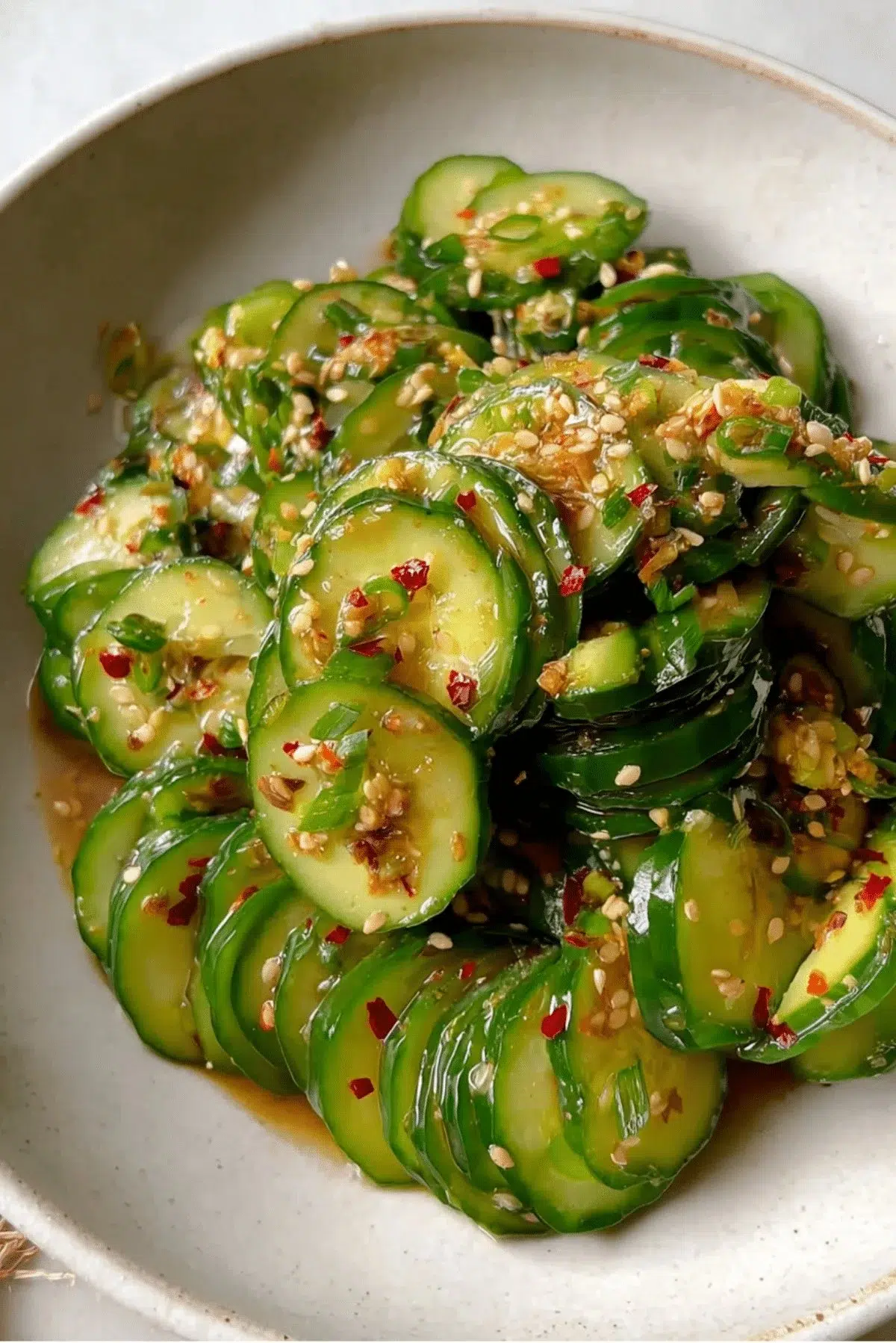 Delicious Asian cucumber salad with fresh vegetables and sesame dressing