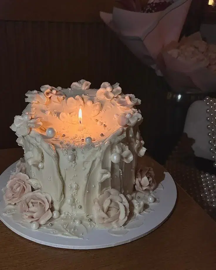 A beautifully decorated Candle Cake for birthday celebrations