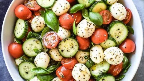 Fresh Cucumber Caprese Salad with tomatoes and mozzarella