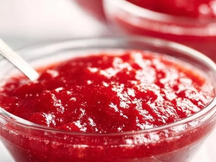 Homemade strawberry cake filling made with fresh strawberries and cream